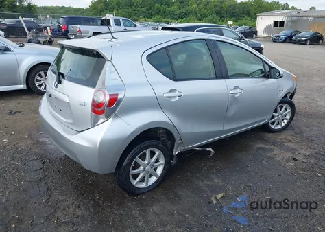 2014 Toyota Prius C Three from USA, damaged, VIN JTDKDTB30E1075790